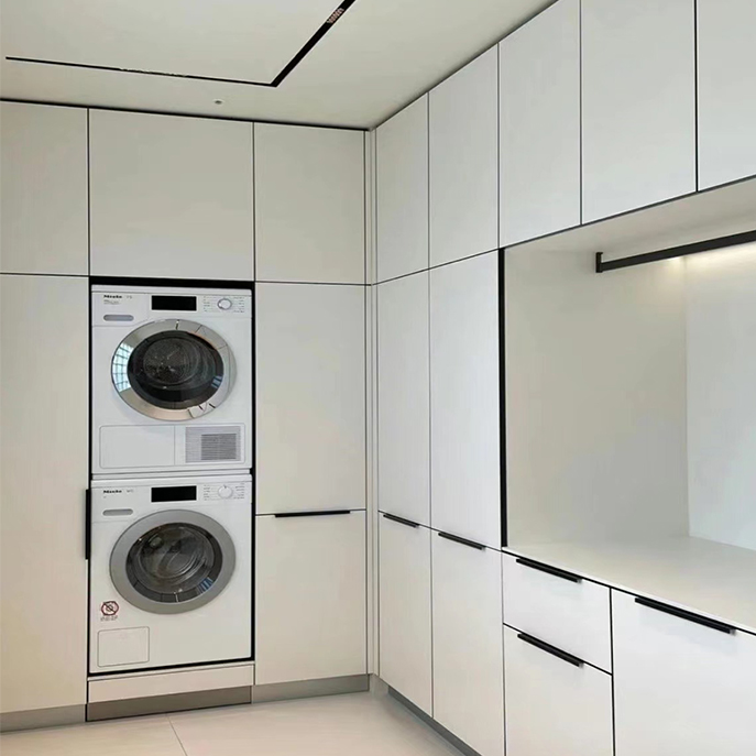 Modern style white laundry room cabinets