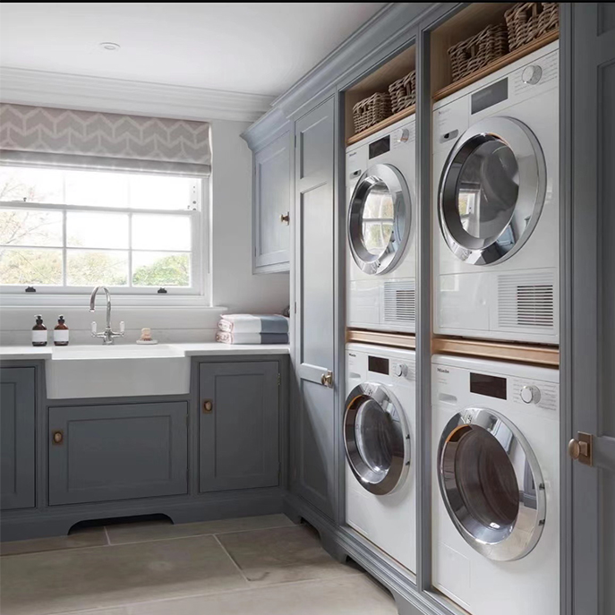 Dove gray shaker style door laundry room cabinets